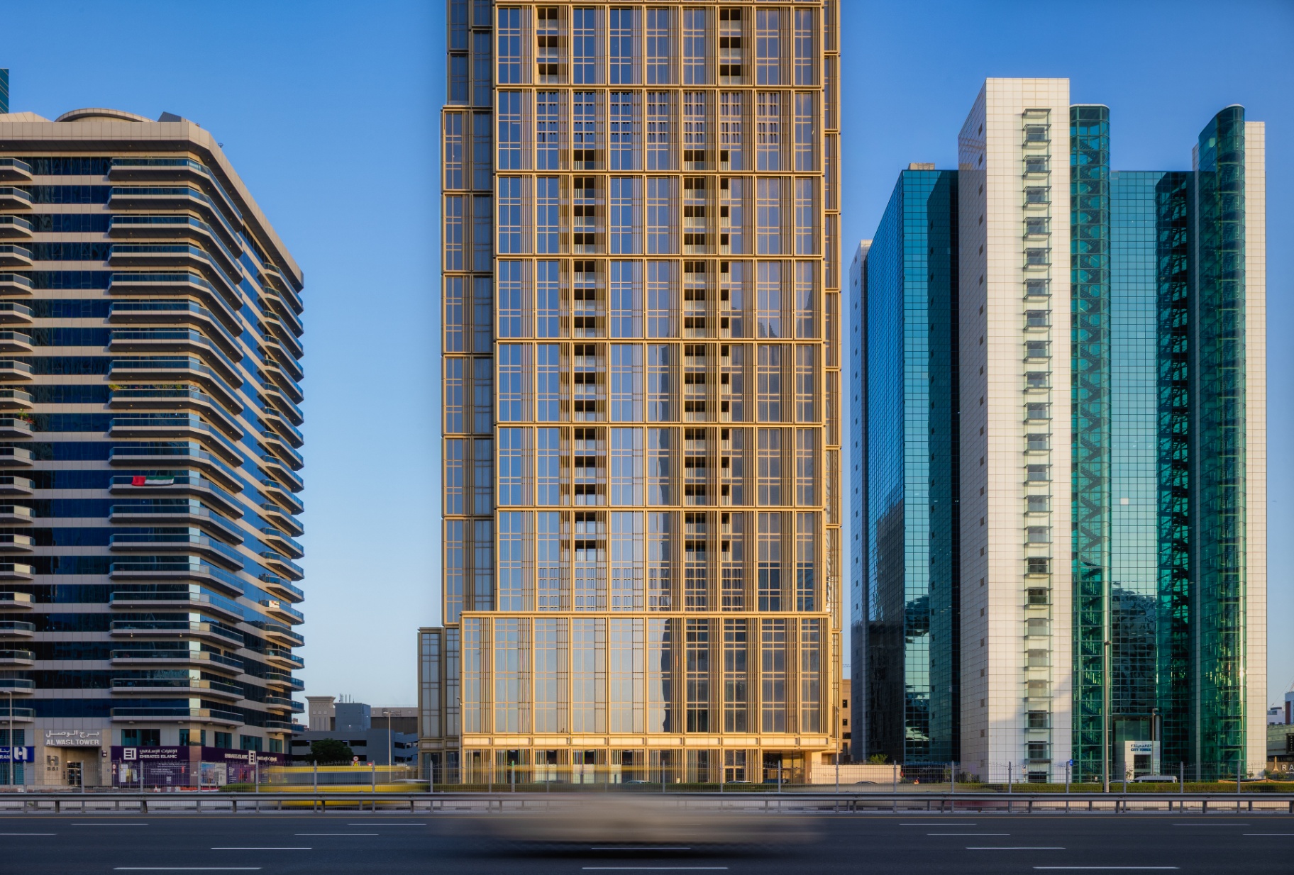 Golden hour skyscraper, Sheikh Zayed Road, Dubai — photographed by John Macharia